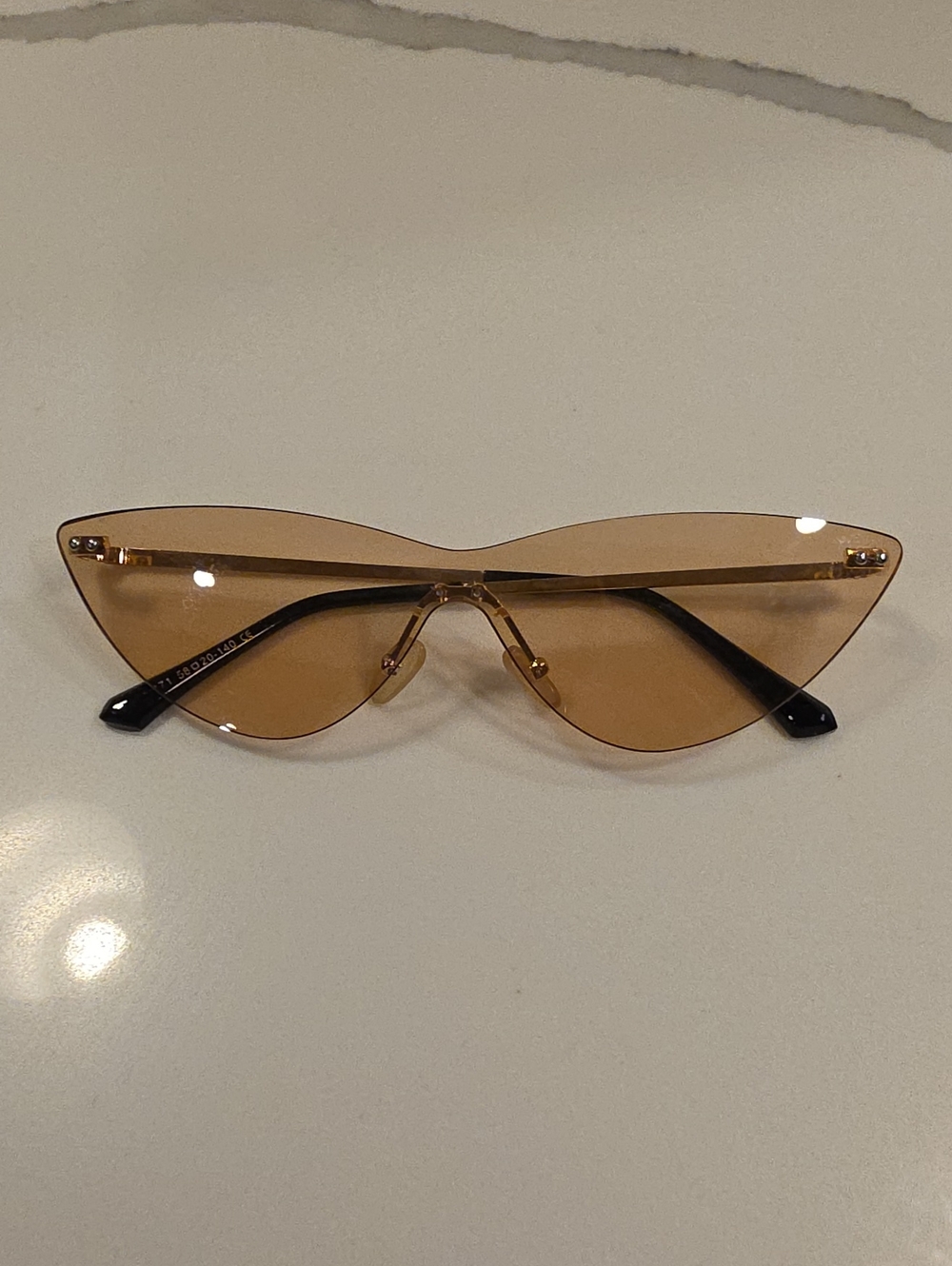 Stylish Cat-Eye Rimless Sunglasses in Brownish Peach